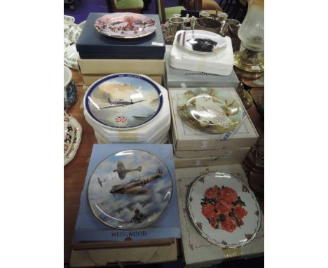 A good selection of ceramic display plates including military and animal interest