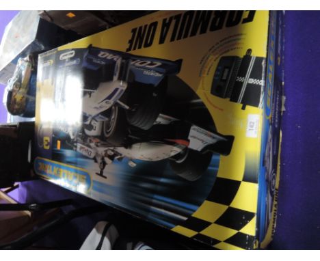 A Formula One Scalextric set
