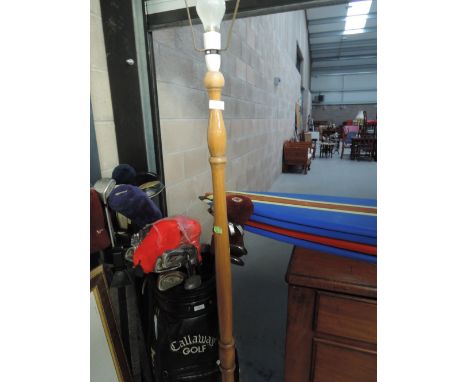 A traditional wood standard lamp