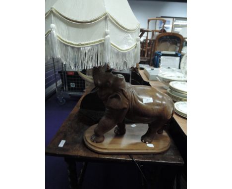 A large sized hand carved African elephant table lamp