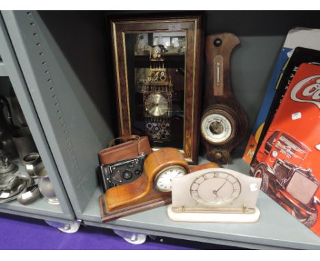 A selection of fine clocks and barometer including enamel faced napoleon style mantle clock