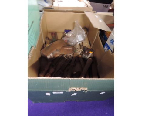 A selection of woodworking tools including small box plane