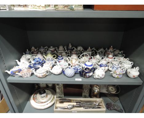 A selection of miniature ceramic teapots by Art Porcelain 