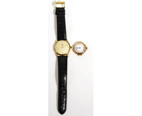 A 9ct gold cased gents Tissot wristwatch with quarter arabic numerals and batons, on leather strap together with a ladies 9ct