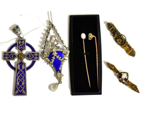 A group of gold brooches and stick pins together with two enamel pendants 