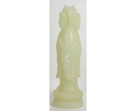 A Chinese jade carving of Guanyin, three sided on lotus base 