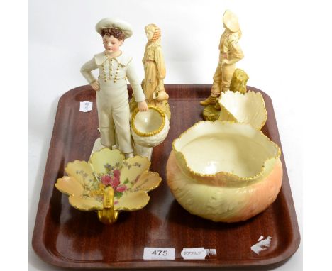 A late 19th century Royal Worcester James Hadley figure of a boy; two further Royal Worcester figures (a.f.); a Worcester lea