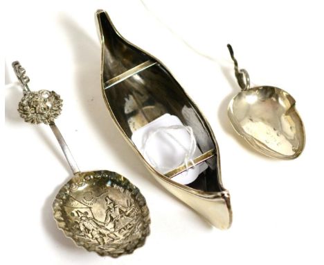 Silver novelty canoe, Chester 1896 by Stokes & Ireland Ltd and two silver caddy spoons 