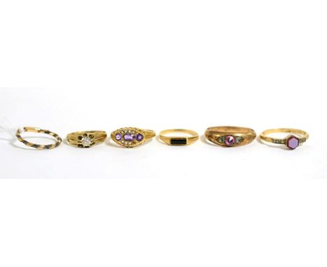 An elephant hair ring, a 9ct gold amethyst and seed pearl ring, a 9ct gold onyx ring, a sardony and paste set ring, a 9ct gol