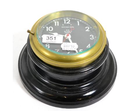A ships type timepiece dial bearing later inscription 'An Elliot clock' and numbered 0552/461-9296 in a later ebonised case, 