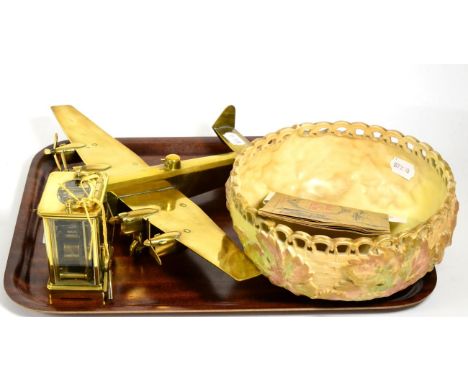 A Royal Worcester blush ivory relief moulded bowl; a brass carriage timepiece; a scratch built brass model of a WWII Halifax 