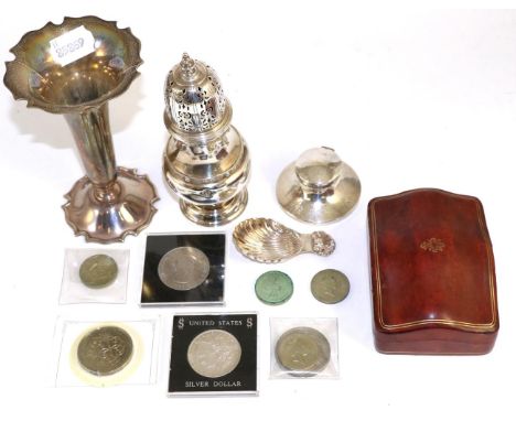 Silver sugar castor; silver caddy spoon; silver mounted inkwell; silver spill vase; and a quantity of coins 