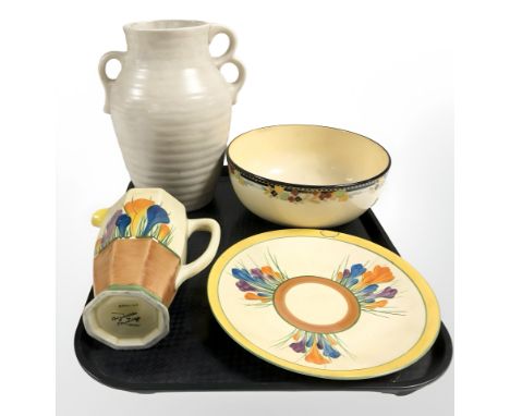 A Clarice Cliff for Newport Pottery Bizarre crocus patterned jug, a further plate (restored), a fruit bowl and a Clarice Clif