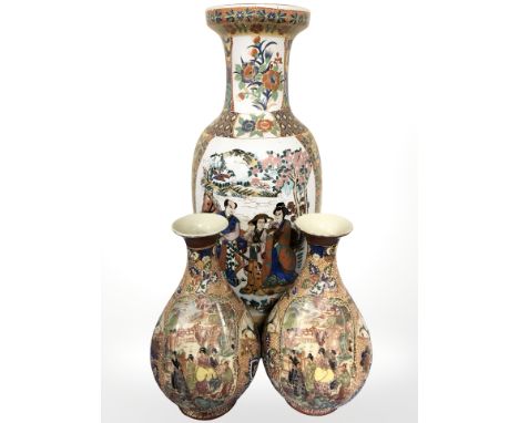 Three 20th century oriental earthenware ceramic vases, tallest 60 cm.