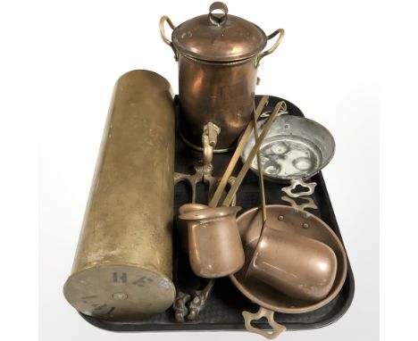 A large brass ammunition shell, together with other metal wares including copper ladles, pans, lidded vessel with tap, etc.