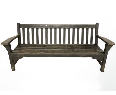 A stained teak garden bench, length 195 cm 