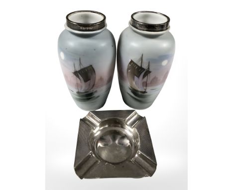 A silver ashtray with engine turned decoration, Birmingham marks, together with a pair of oriental silver rimmed vases, heigh