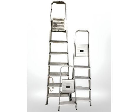 Three aluminium step ladders 