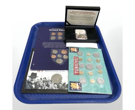 A Capsule Edition Paddington at the Tower of London fifty pence piece, in case of issue, together with a 50th anniversary of 