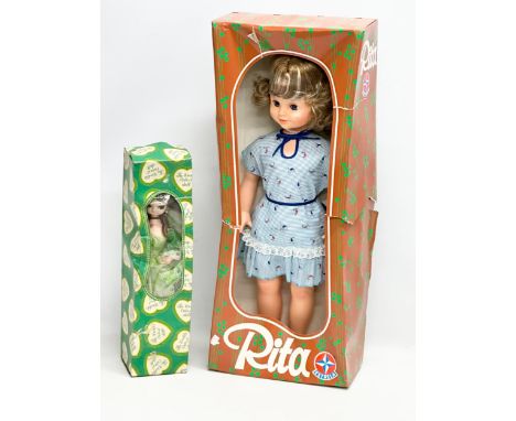 2 vintage dolls with boxes. An Estrela ‘Rita’ doll 68cm. The Worlds Cutest Doll 