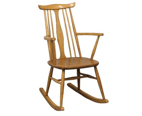 A vintage beech rocking chair 