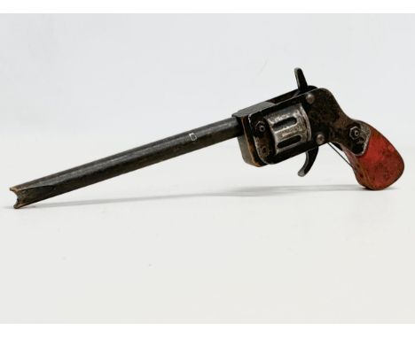 A vintage toy revolver pistol. 32cm 