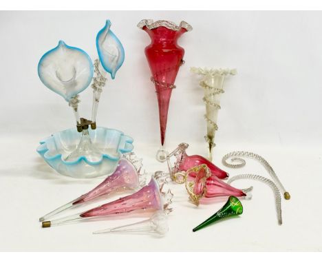 A Victorian epergne and parts. A pair of Victorian Cranberry and Vaseline Glass epergne branches 30cm. A large Victorian Ruby