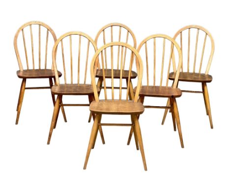 A set of 6 Ercol Mid Century blonde Elm dining chairs. Model 370. 