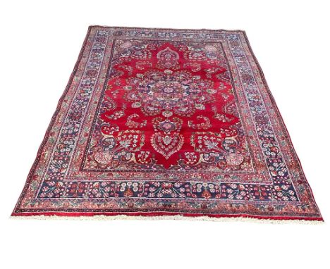 A very large vintage Middle Eastern hand knotted rug. 297x197cm 