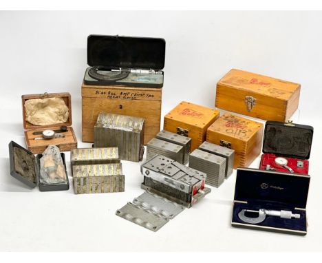 A collection of vintage precision tools. Eclipse magnetic chuck blocks, micrometers etc. 