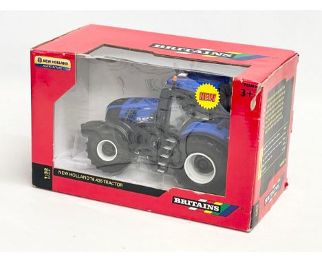 An unused Britains “New Holland” T8.435 Tractor in box. 1:32 scale. 25x13x15.5cm 