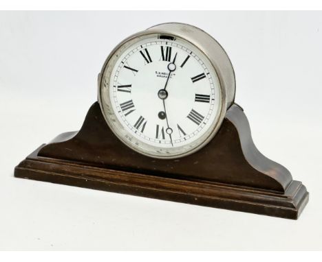 An early 20th century mahogany and heavy plated mantle clock. S.D. Neill LTD, Belfast. 31.5x7x18cm 