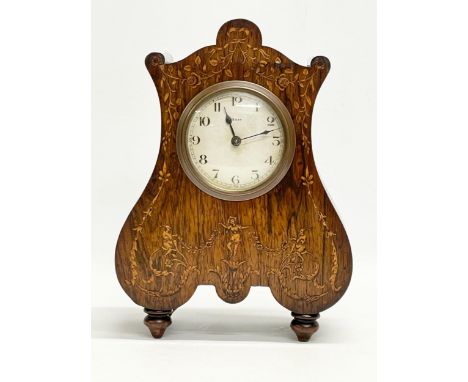A late 19th century French inlaid rosewood mantle clock. 20x10x28cm 