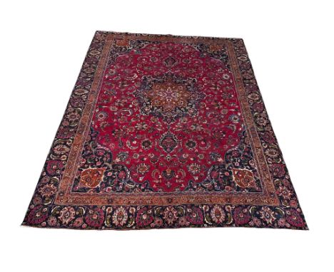 A very large vintage Middle Eastern hand knotted rug. 349x272cm 