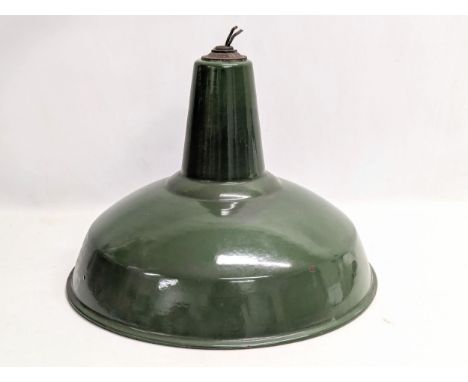A vintage industrial light fitting.44x40cm 