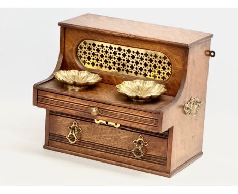 A late 19th century Neo Gothic oak desktop piano form caddy. Circa 1880. 28x20x24.5cm 