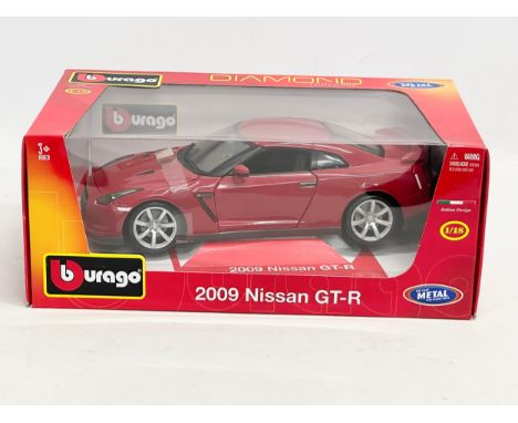 A Burago Diamond Collection 2009 Nissan GT-R model car with box. 30cm. 