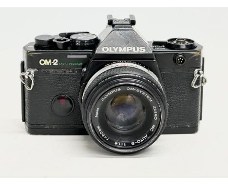 A vintage Olympus OM-2 camera. 