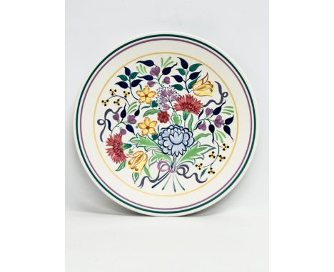 A large 1930’s Poole Pottery charger designed by Gwen Haskins. 35cm 