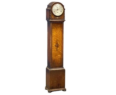 A vintage oak cased Granddaughter clock. No weights or pendulum. 133cm (9) 