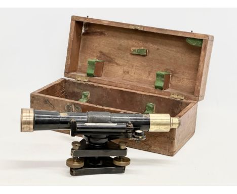 An early 20th century Hallbro theodolite in case. Theodolite measures 35cm. Case measures 9x17x15cm 