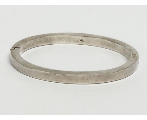 A 925 silver bangle. 16.73 grams. 7x6cm. 