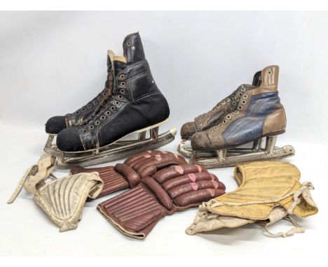 A collection of vintage ice hockey clothing. Including skates. 