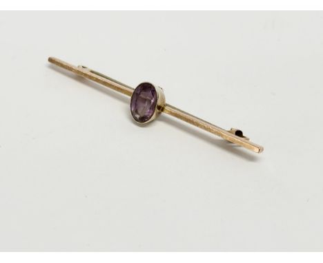 A 9ct gold and amethyst brooch. 3.47 grams. 6cm 
