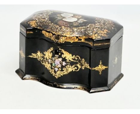 A mid 19th century Jennens &amp; Bettridge gilt and Mother of Pearl inlaid lacquered tea caddy with original key. 20x13x11cm 