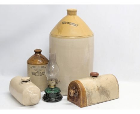 A collection of vintage stoneware with oil lamp. Largest measures 55cm 
