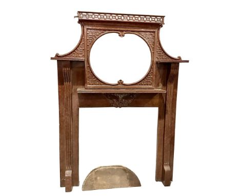 A large late 19th century Chinese Chippendale Revival cast iron marble affect mirror back fire surround. 151x22x210cm 