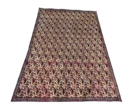 A very large vintage Middle Eastern style hand knotted rug.  324x223cm 