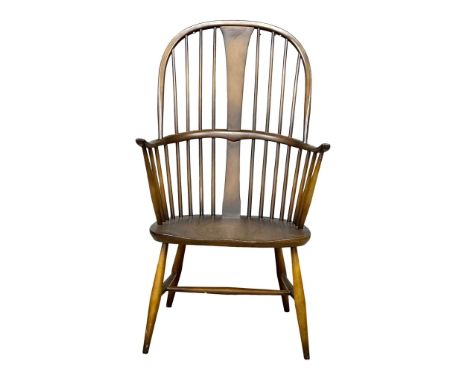 An Ercol Mid Century elm and beech Windsor armchair. Model 472. 