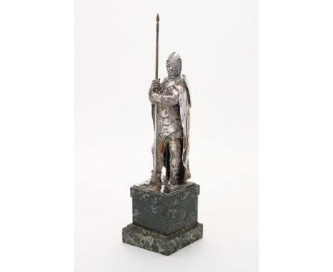 
	
		A GERMAN SILVER MODEL OF A KNIGHT
		POST 1886 .900 STANDARD
		Mounted on a marble plinth
		39.5cm (14 1/2in) high
		
		C